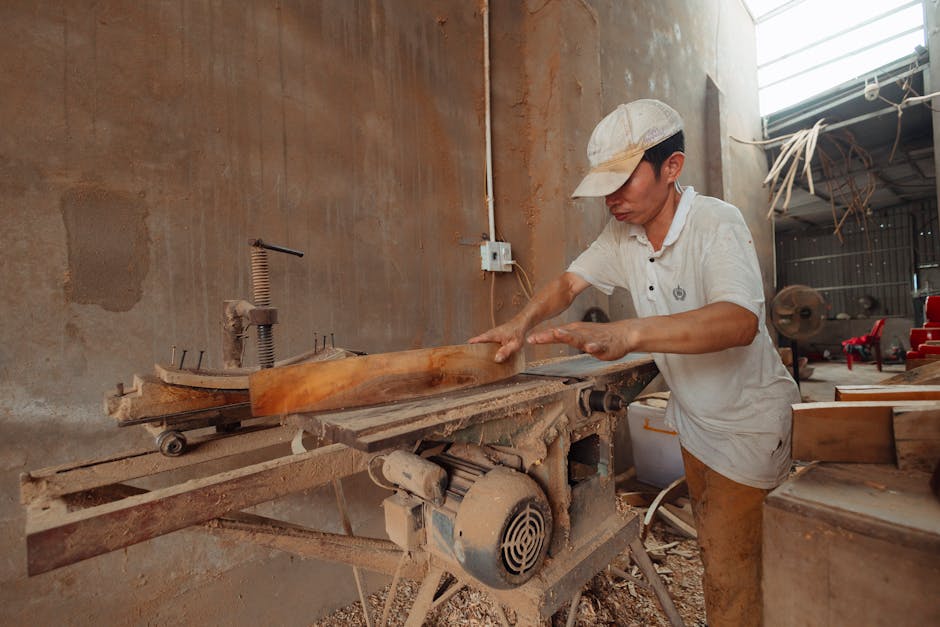 Carpenter working in a woodworking workshop