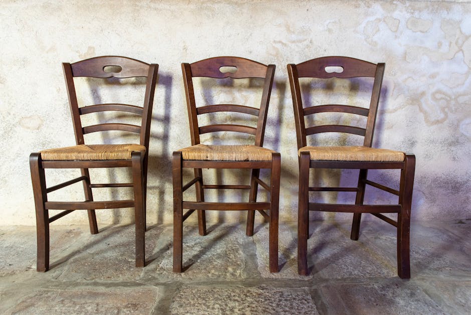 A beautifully crafted custom wooden chair in a modern setting